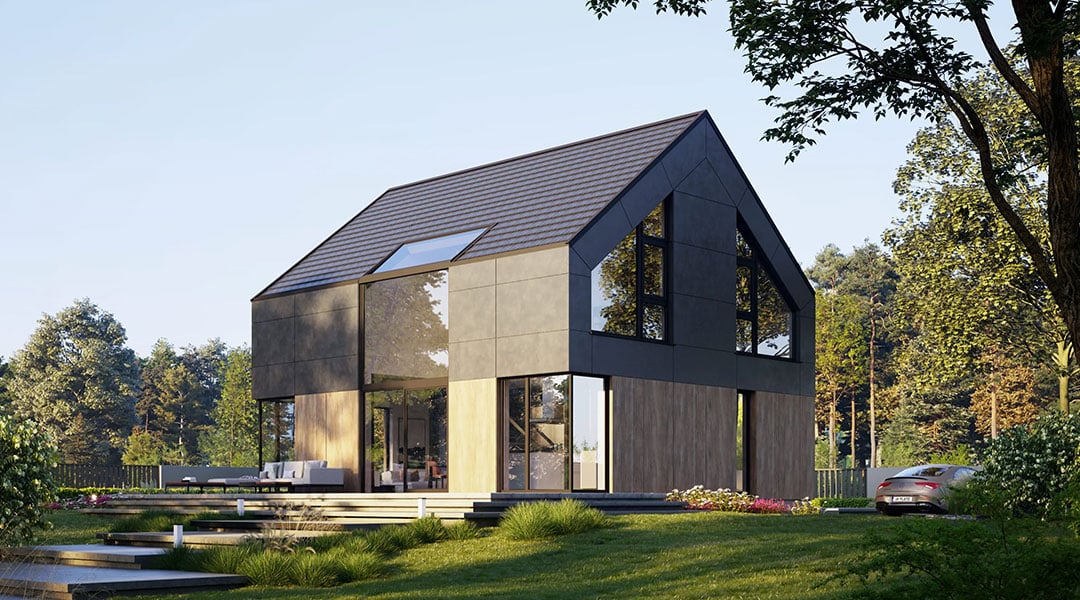 Contemporary two‑storey Bespoke Custom Build Home with steep pitched roof, full‑height glazing, timber accents and landscaped garden.