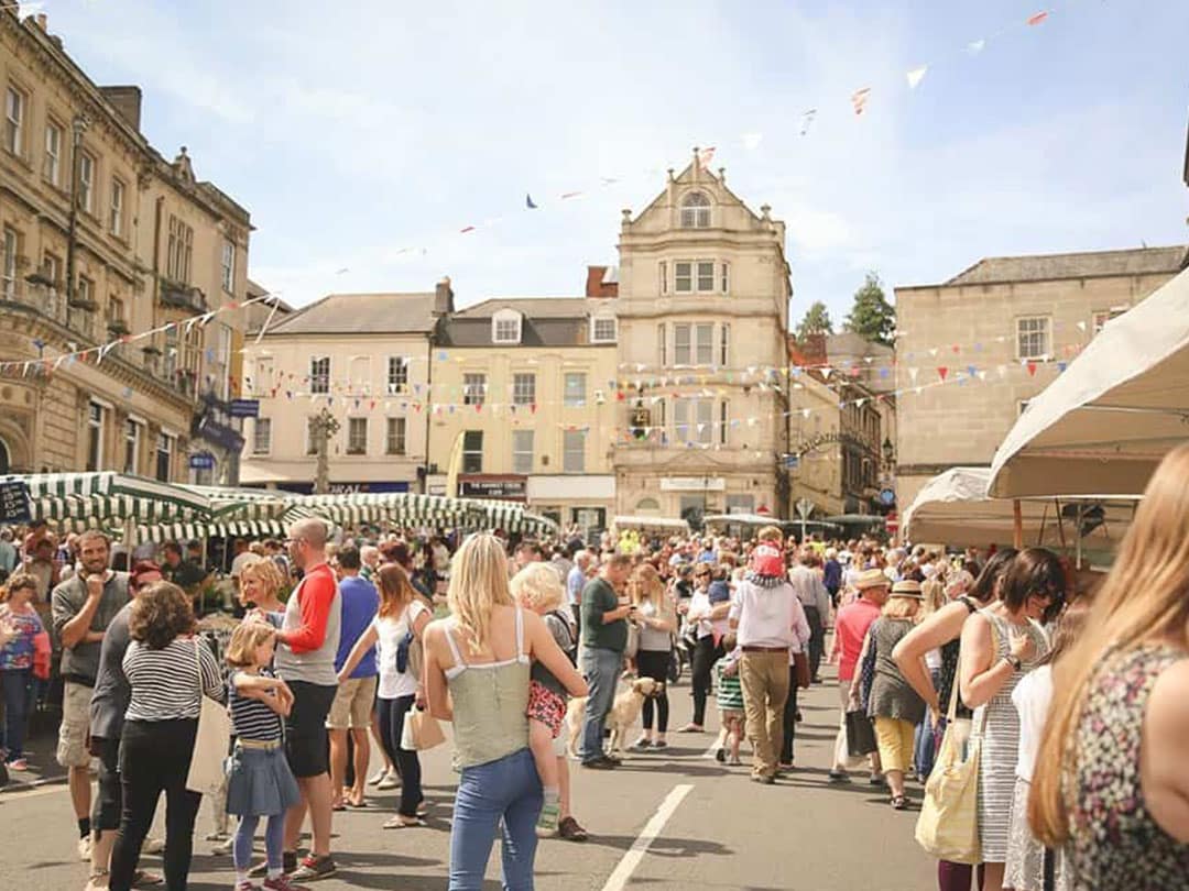 City of Frome town centre, people enjoying a festival day