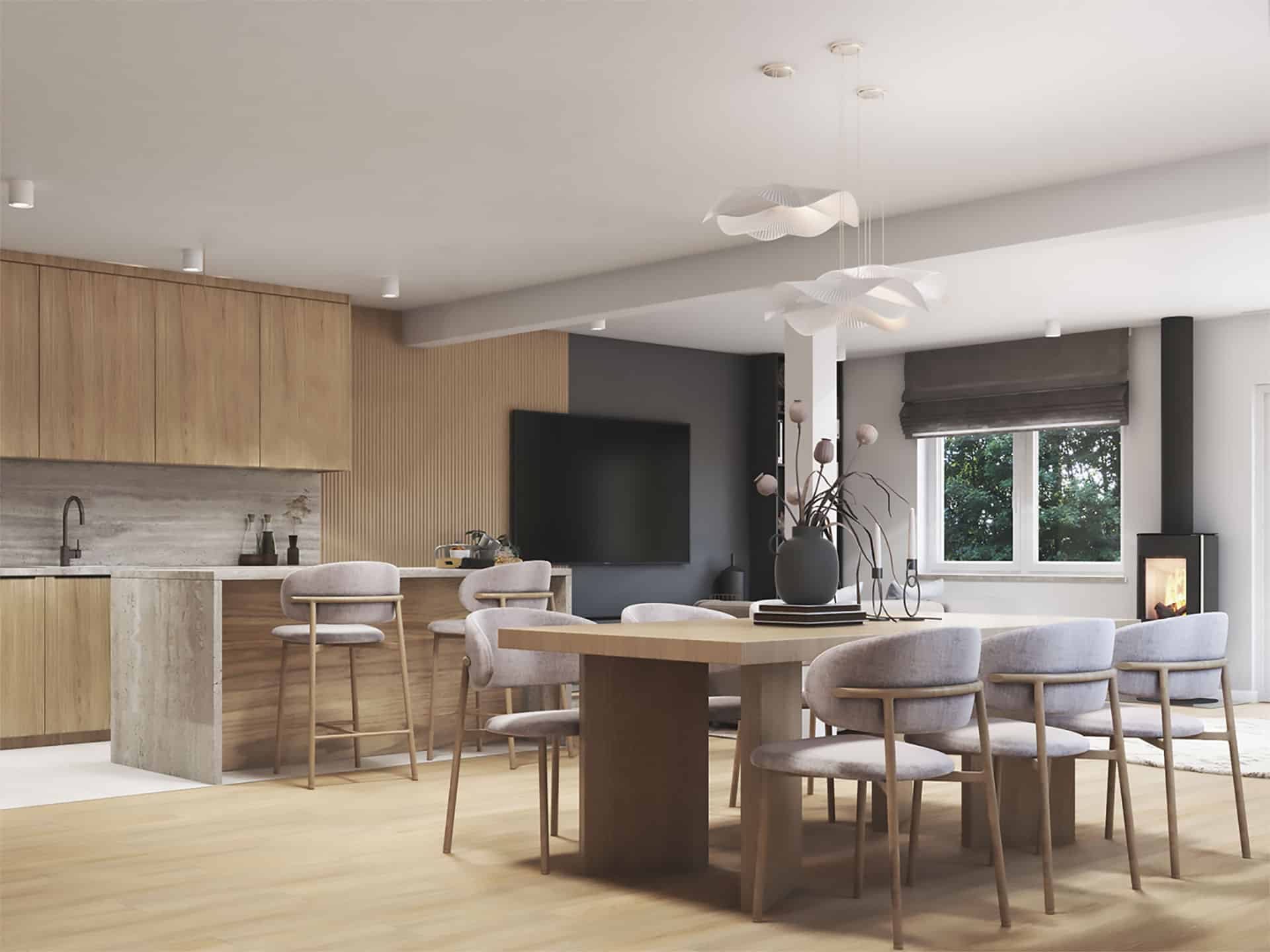 Modern open‑plan kitchen and dining area with light wood cabinetry, sculptural pendant lighting and contemporary furnishings in a Bespoke Custom Build Home.